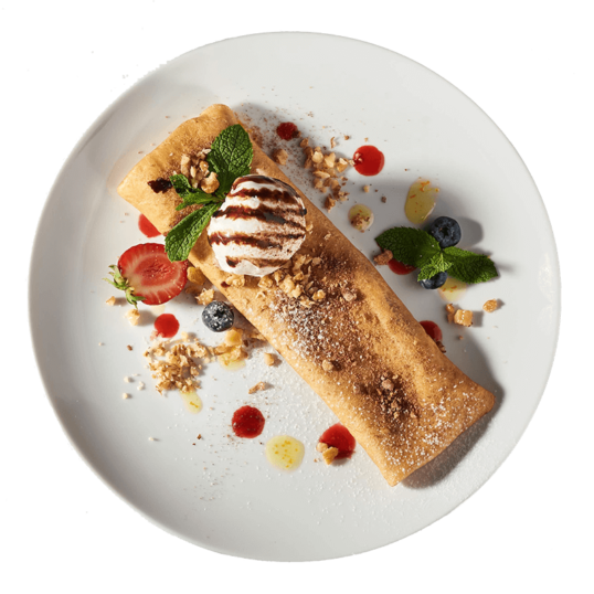 Солодкий млинець з нутелою та горіхами